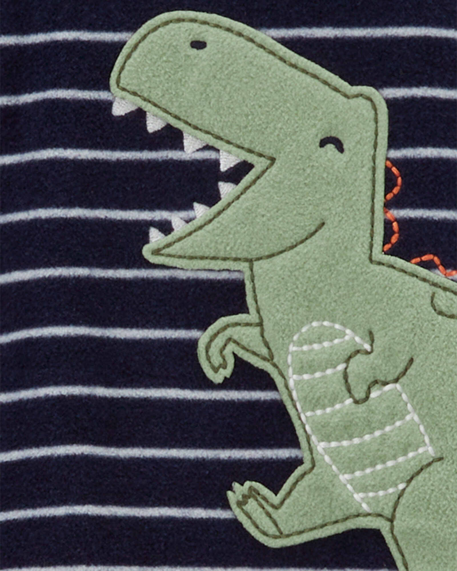 Pijama una pieza de micropolar, con pie, estampa dino Pijama una pieza de micropolar, con pie, estampa dino