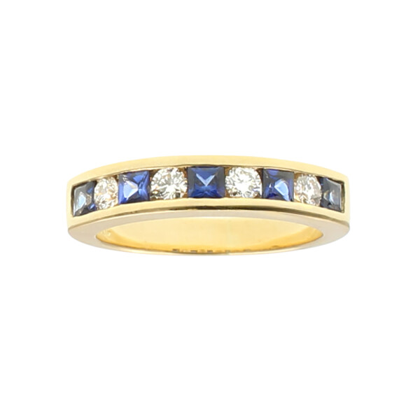 Anillo medio sin fin chana Bicolor en oro amarillo 18k con brillantes y zafiros Anillo medio sin fin chana Bicolor en oro amarillo 18k con brillantes y zafiros