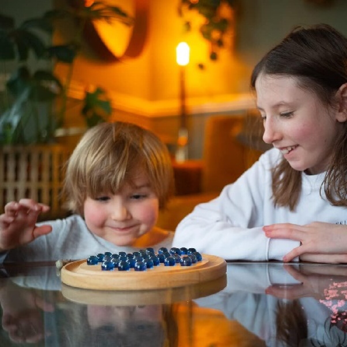 Juego de mesa Solitario con canicas 
