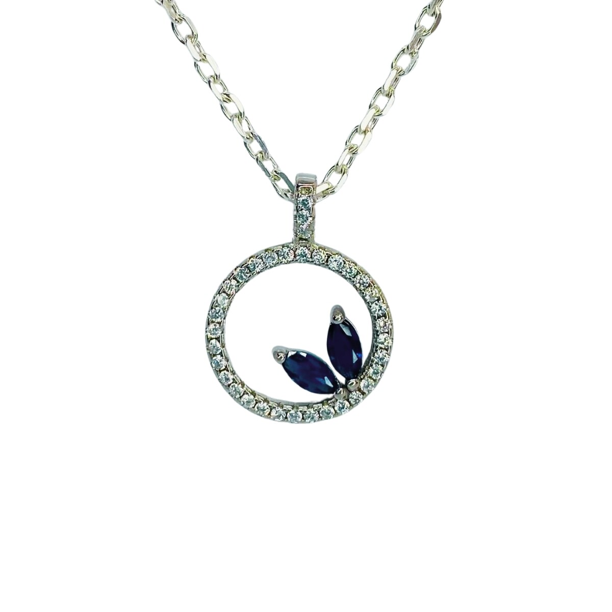 DIJE DE PLATA CON CIRCONIAS Y PIEDRAS AZULES 