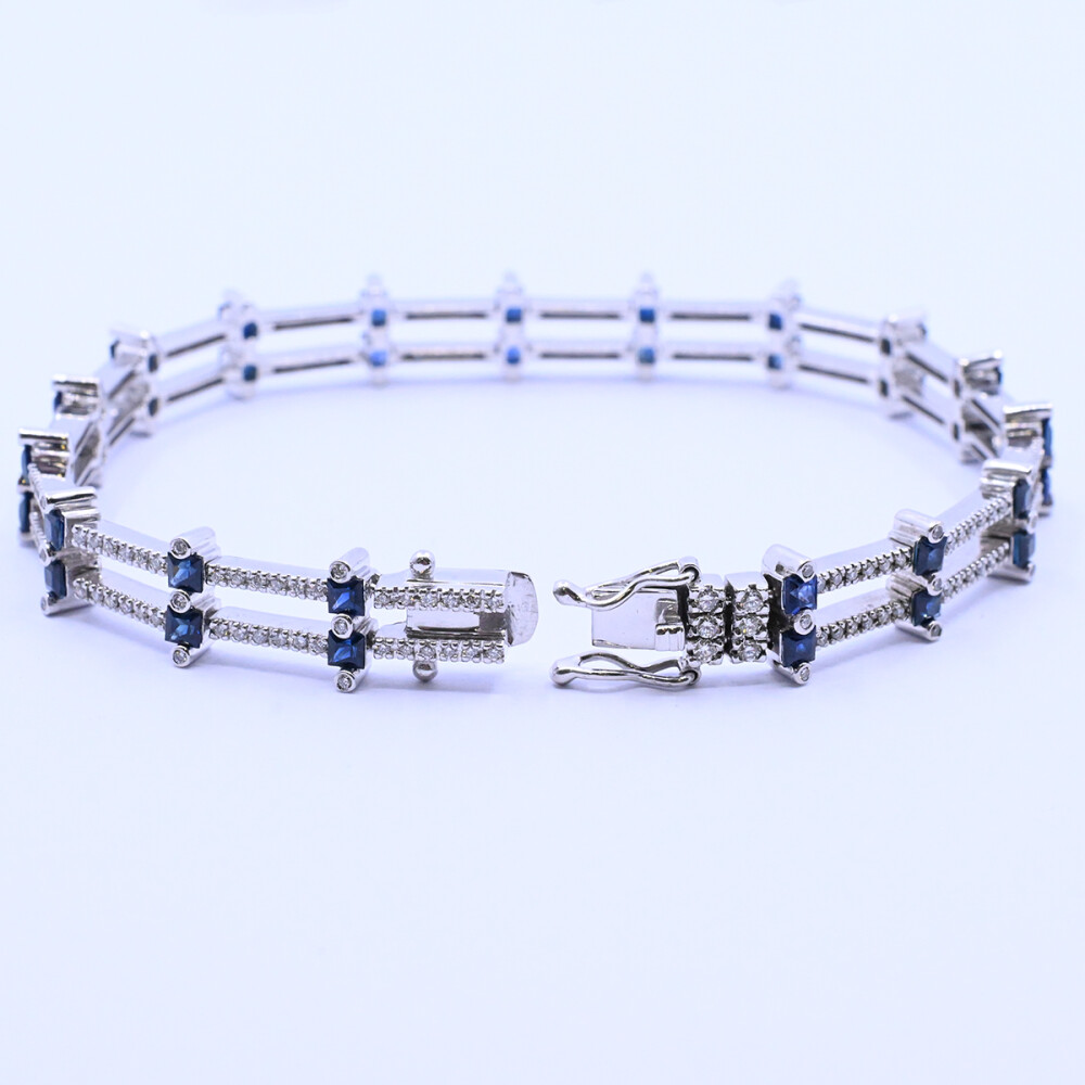 Pulsera articulada oro 18k blanco brillantes y zafiros carré. Pulsera articulada oro 18k blanco brillantes y zafiros carré.