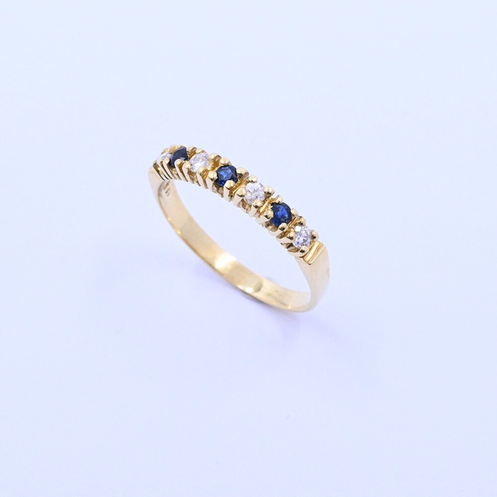Anillo oro 18k con brillantes y zafiros. Anillo oro 18k con brillantes y zafiros.
