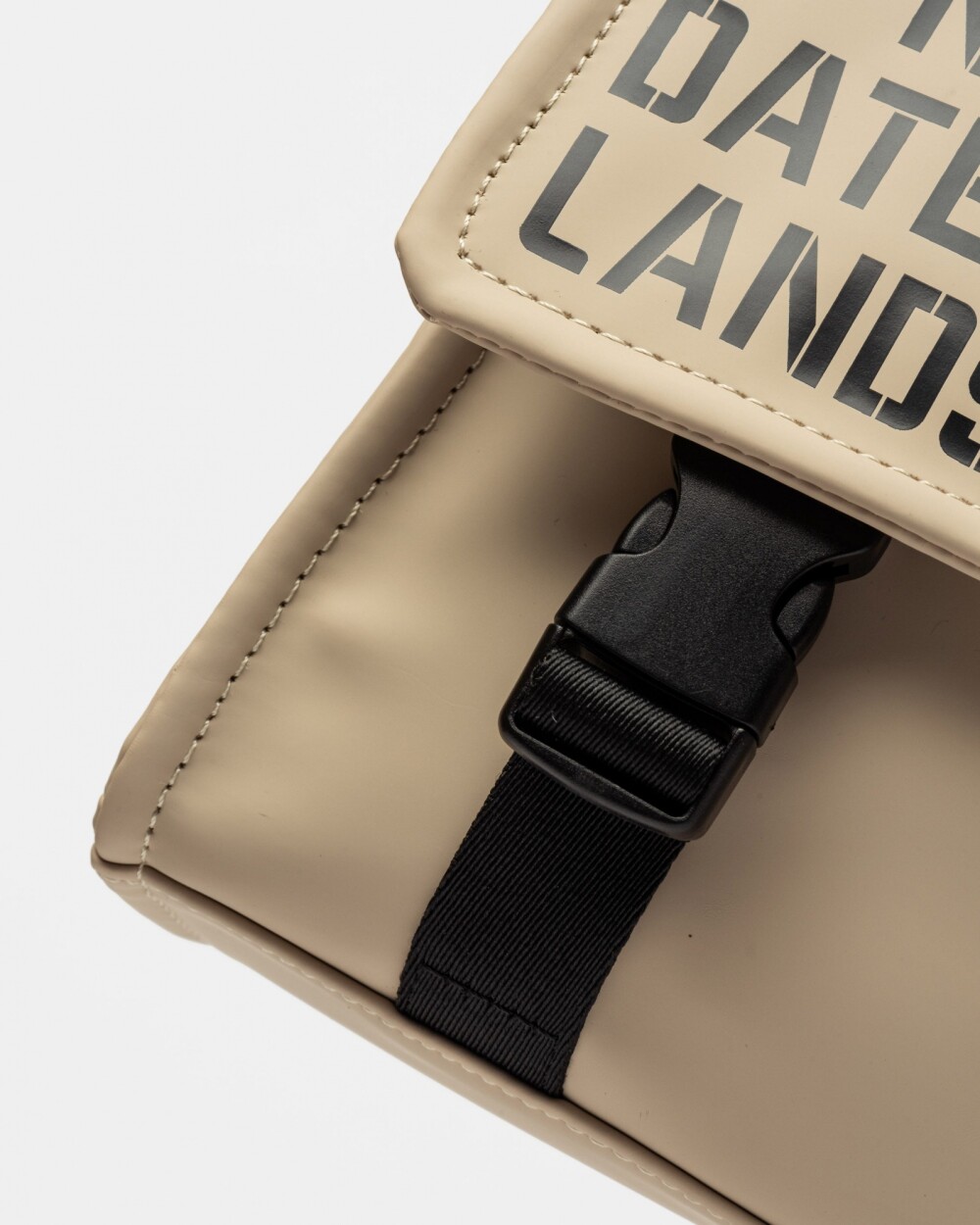 Bandolera Daily en efecto cuero rubber Taupe