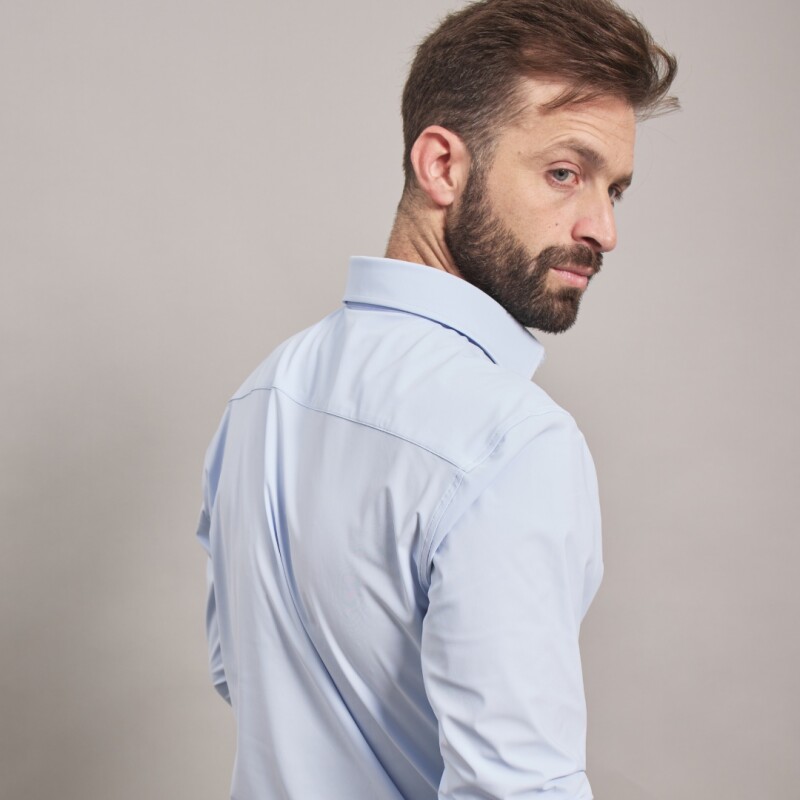 CAMISA TECNICA CELESTE