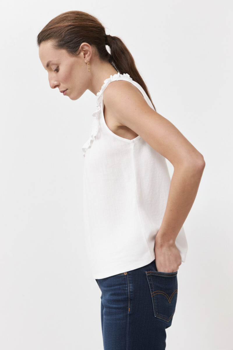 Top con broderie y volados blanco