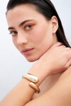 Brazalete cuff wavy dorado
