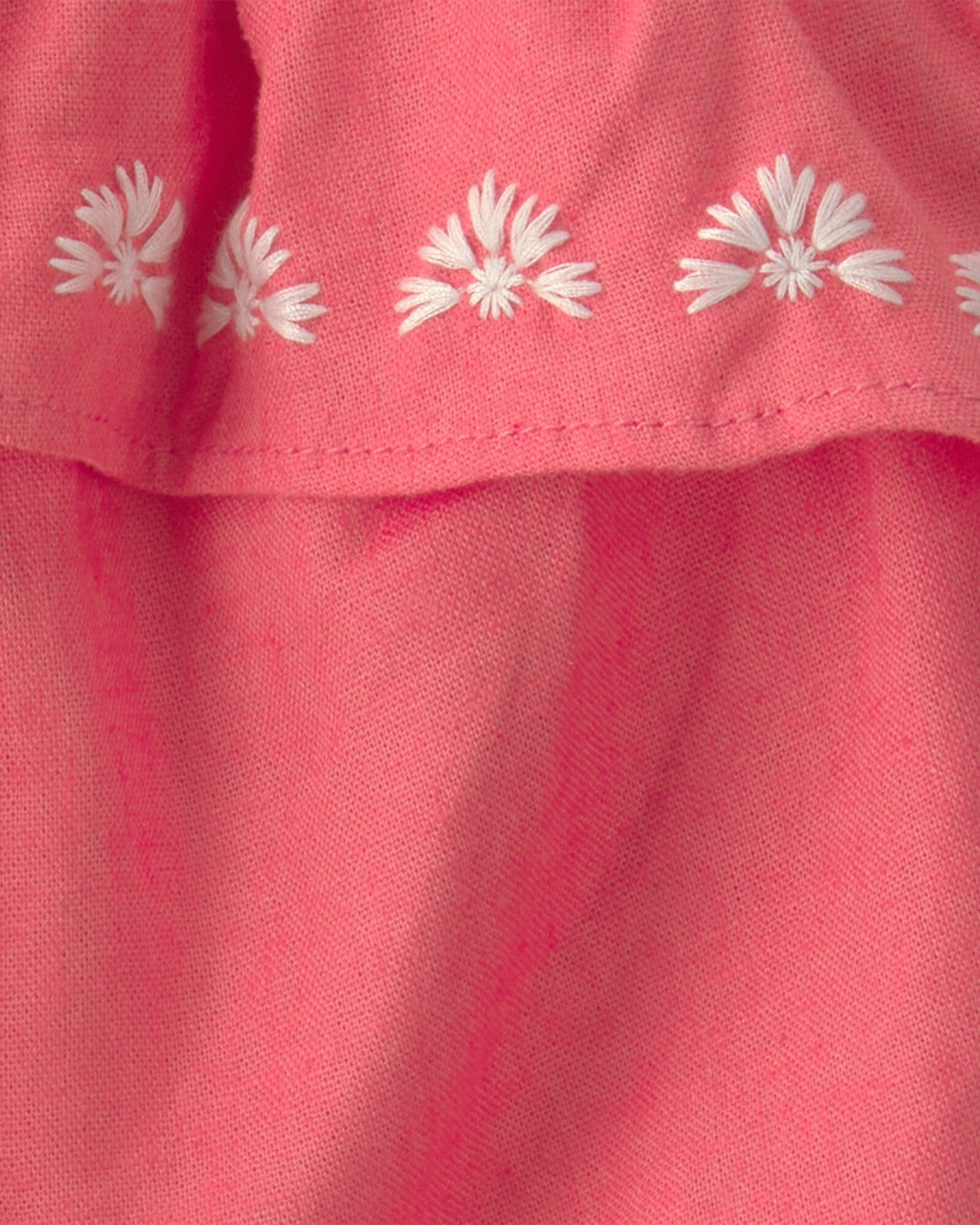 Set dos piezas de lino, short marfil y musculosa coral Set dos piezas de lino, short marfil y musculosa coral