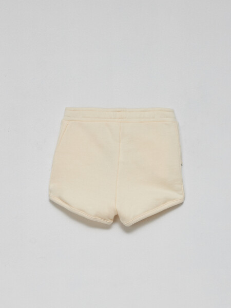 Short deportivo Volados crema