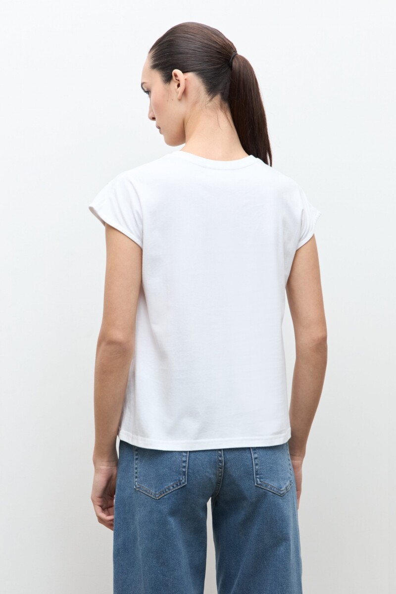 PREVENTA Remera bordado floral y vainillas blanco