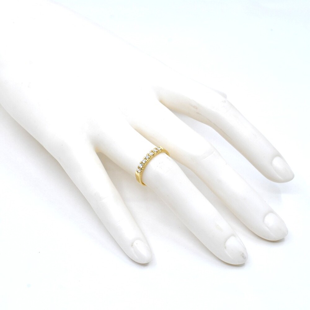 Anillo medio sin fin en oro 18k y brillantes Anillo medio sin fin en oro 18k y brillantes