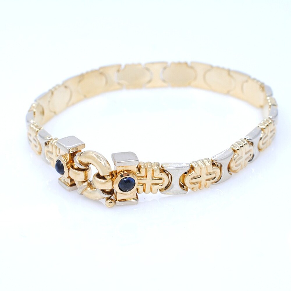 Pulsera en oro 18k combinada en 2 tonos con zafiros cabujón Pulsera en oro 18k combinada en 2 tonos con zafiros cabujón