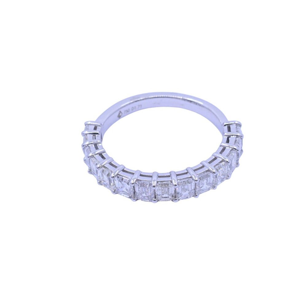 Anillo medio sin fin 18k blanco con 14 brillantes tallado esmeralda. Anillo medio sin fin 18k blanco con 14 brillantes tallado esmeralda.
