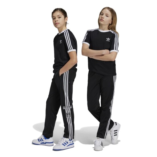 Pantalones adidas con botones laterales top