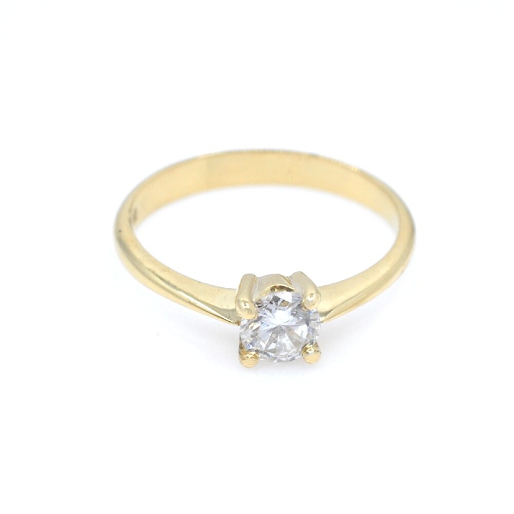 Anillo en oro 18k y brillante con engarce 4 puntas Anillo en oro 18k y brillante con engarce 4 puntas