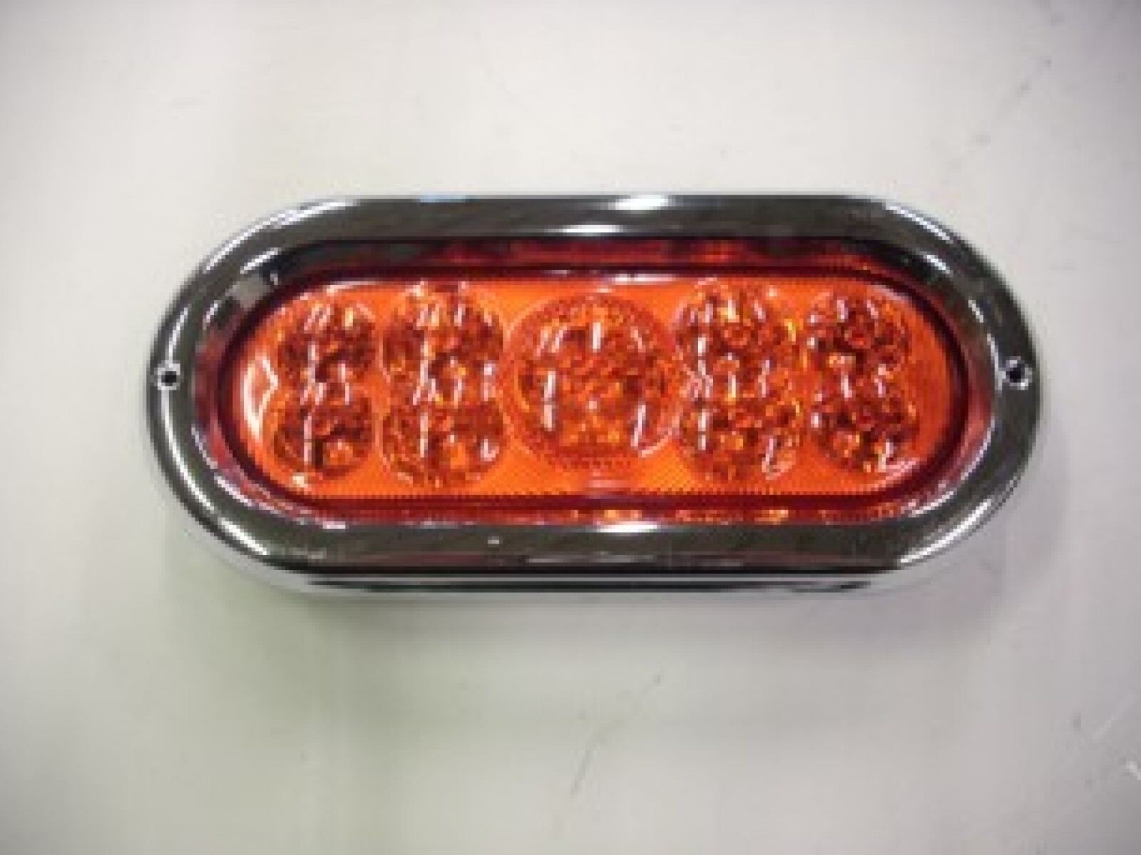 FARO LED - LATERAL OVALADO CON LED ROJO 24V - 