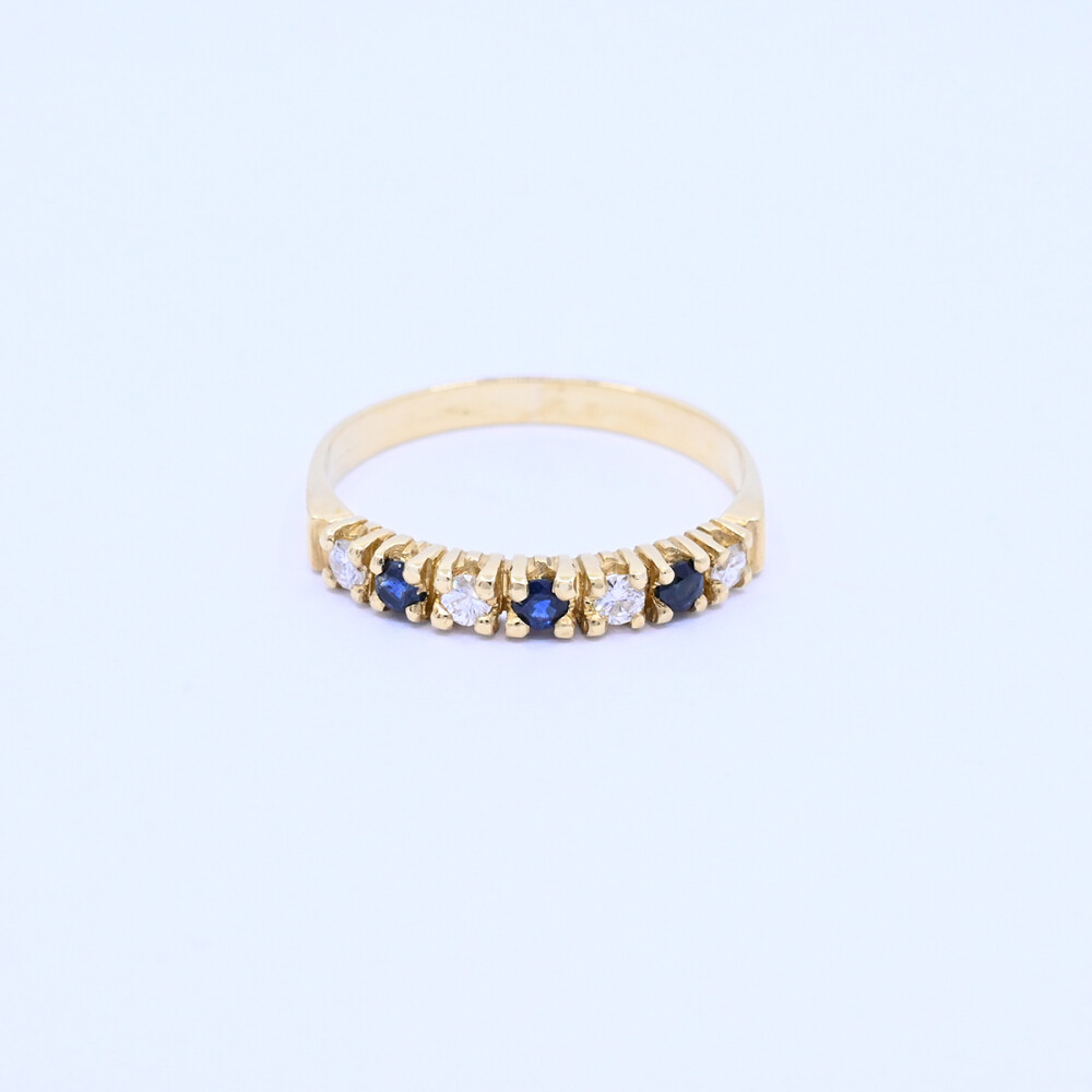 Anillo oro 18k con brillantes y zafiros. Anillo oro 18k con brillantes y zafiros.