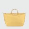 Longchamp -Bolso de viaje Longchamp plegable con cierre y asa corta, Le pliage green Amarillo Pastel