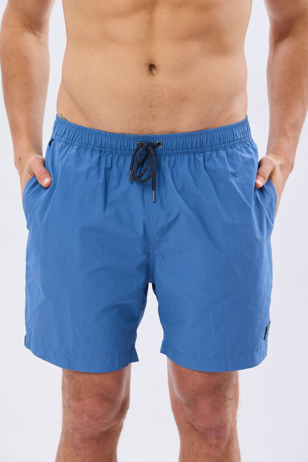 SHORT DE BAÑO LISO Celeste
