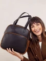 MOCHILA CLARA NEGRO Y SUELA