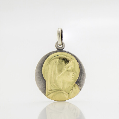 Medalla religiosa virgen niña de plata 900 y oro 18k., 2cm. Medalla religiosa virgen niña de plata 900 y oro 18k., 2cm.