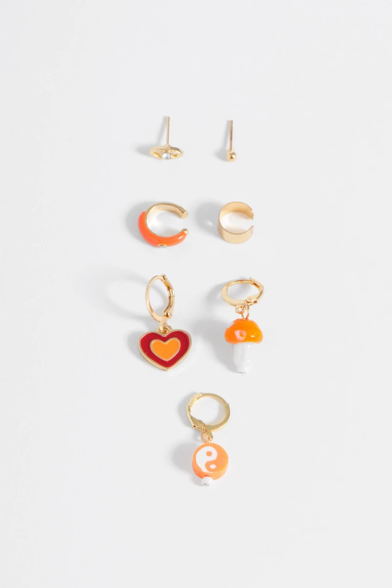 Set de caravanas dijes multiples dorado