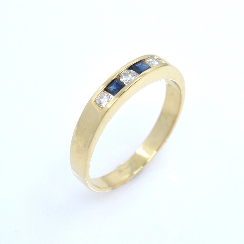 Anillo en oro 18k amarillo, brillantes y zafiros Anillo en oro 18k amarillo, brillantes y zafiros