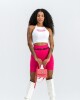 Remera top tipo musculosa blanca con letras rosadas U