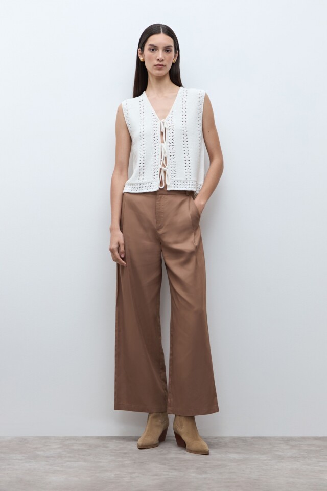 Chaleco con lazos crudo