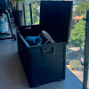 Caja baúl para exterior con ruedas negro