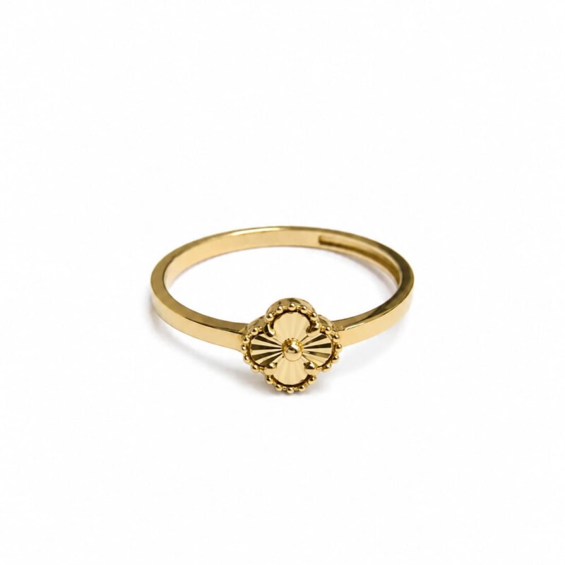 Anillo Flor al centro. Oro 10kt Anillo Flor al centro. Oro 10kt