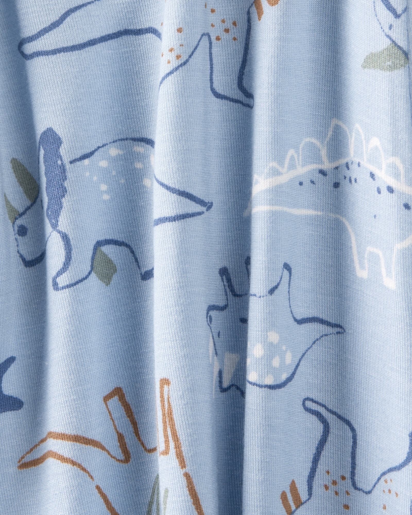 Pijama uno pieza de viscosa Ecovero, con pie, diseño dinos, línea Purelysoft. Talles PRE-9M Pijama uno pieza de viscosa Ecovero, con pie, diseño dinos, línea Purelysoft. Talles PRE-9M
