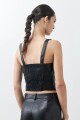 Top eco cuero con cortes y tul negro