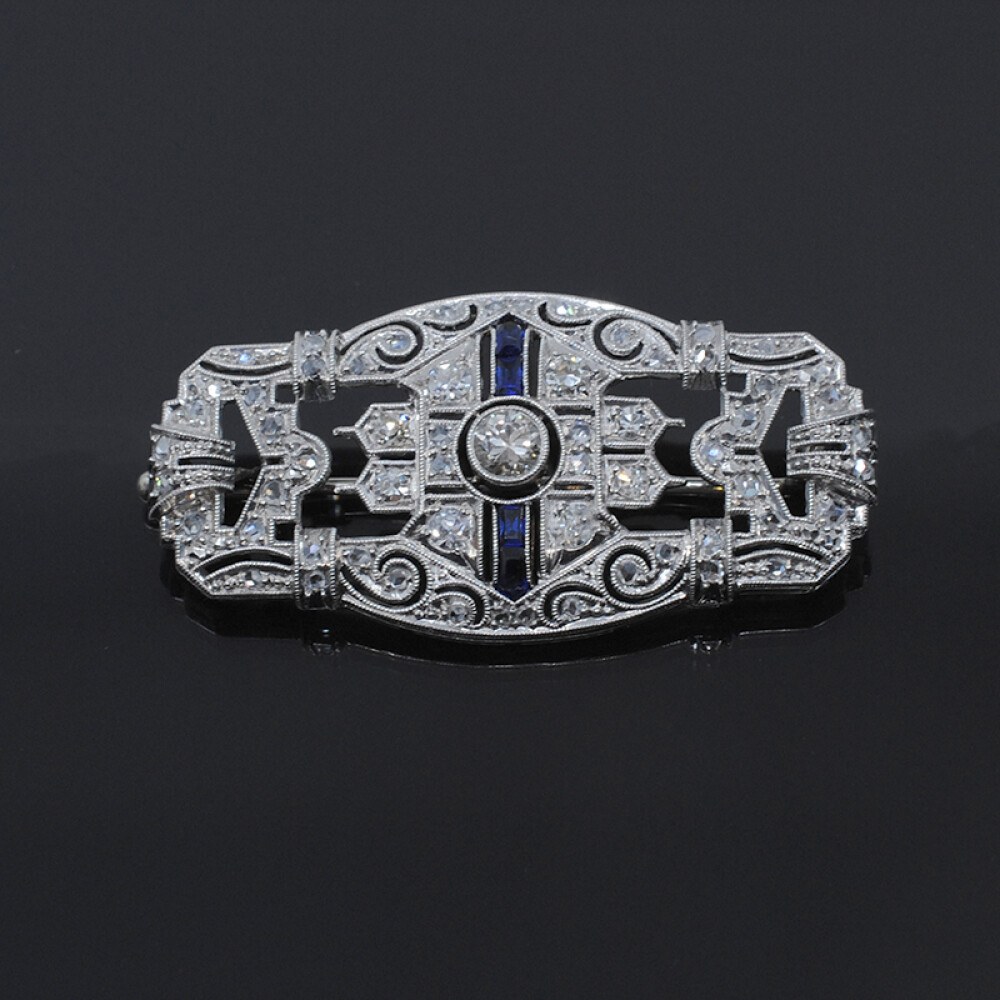 Prendedor plaqueta en oro 18k blanco con brillantes , diamantes y zafiros sintéticos Prendedor plaqueta en oro 18k blanco con brillantes , diamantes y zafiros sintéticos