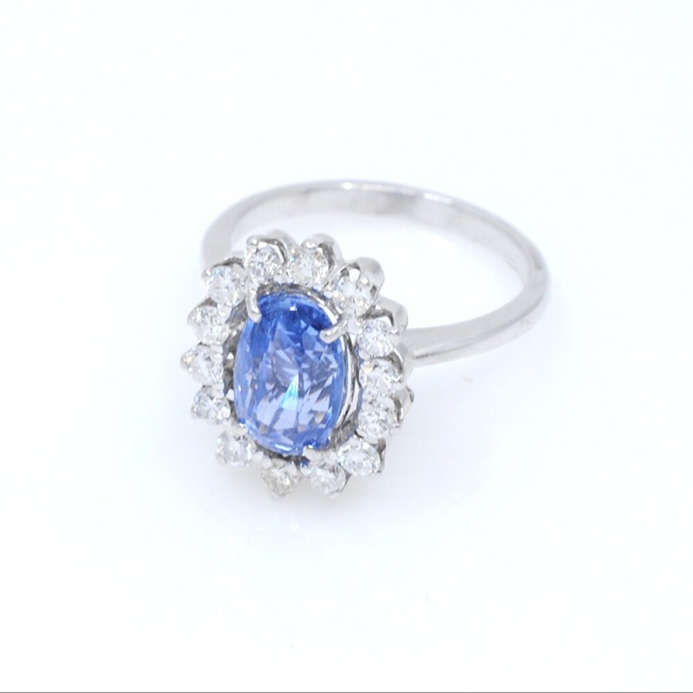 Anillo en oro 18k blanco , brillantes y zafiro Anillo en oro 18k blanco , brillantes y zafiro