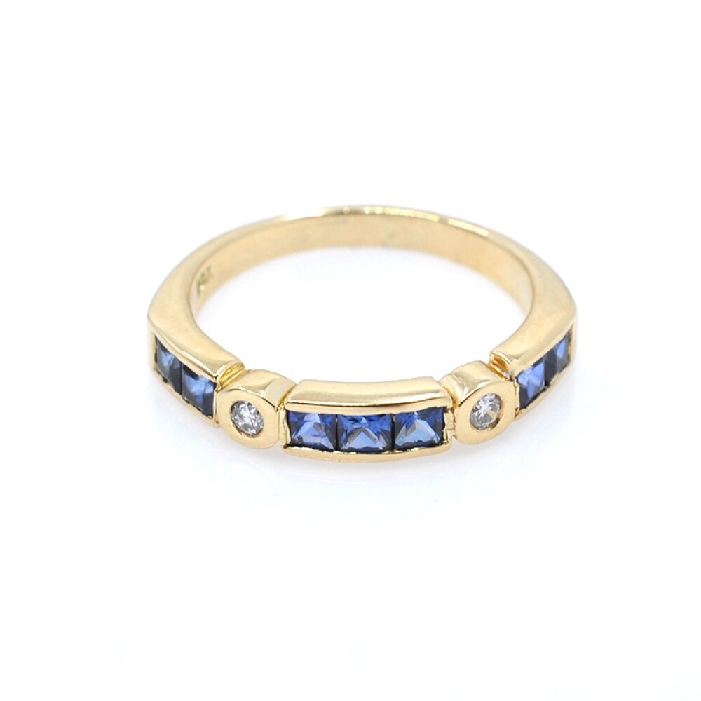 Anillo en oro 18k con zafiros azules carré y 2 brillantes Anillo en oro 18k con zafiros azules carré y 2 brillantes