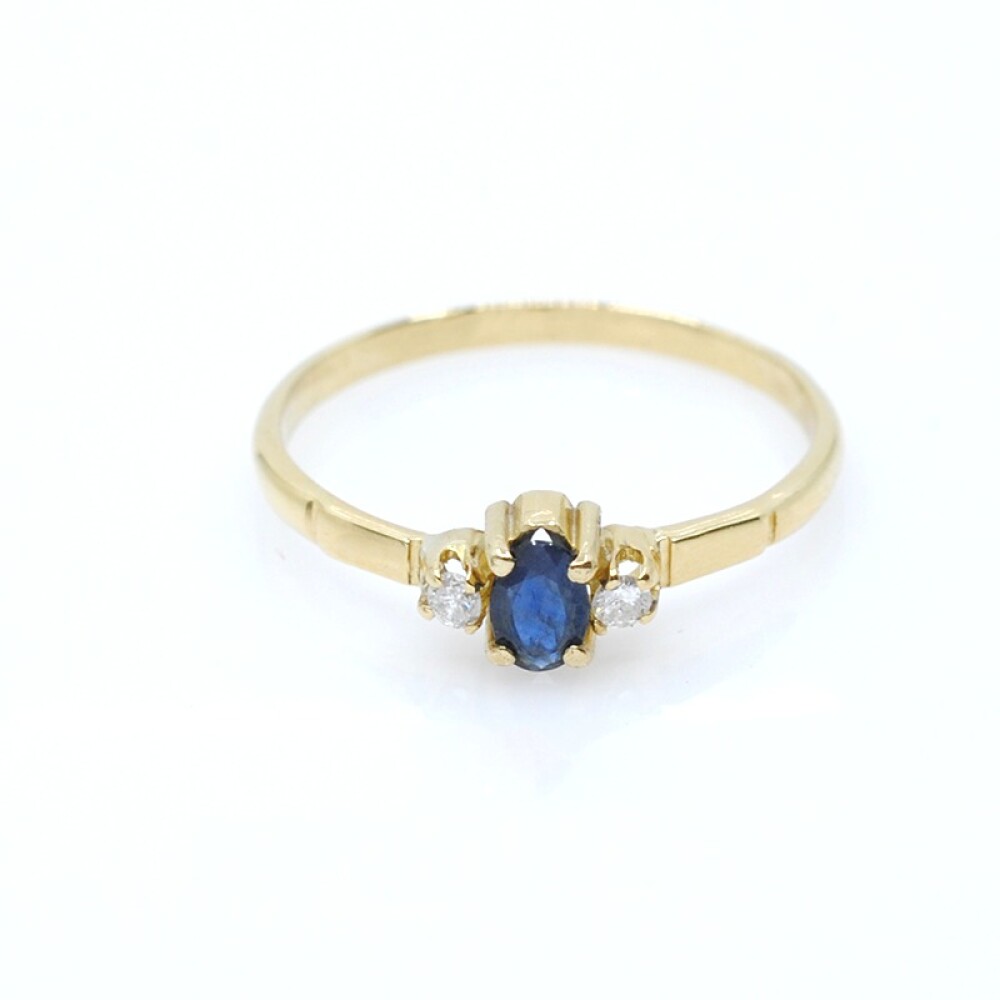 Anillo en oro 18k zafiro y brillantes Anillo en oro 18k zafiro y brillantes