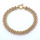Pulsera Panther en oro 18k de 3 tonos con argolla marinera Pulsera Panther en oro 18k de 3 tonos con argolla marinera