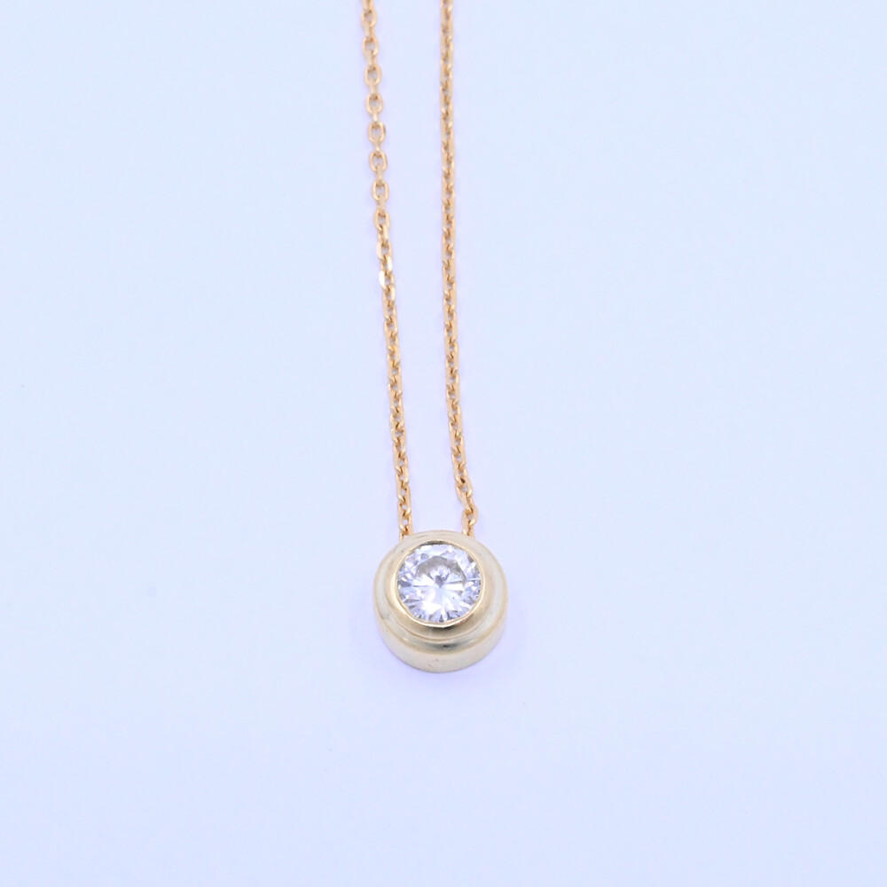 Dije oro 18k y brillante doble virola. Dije oro 18k y brillante doble virola.