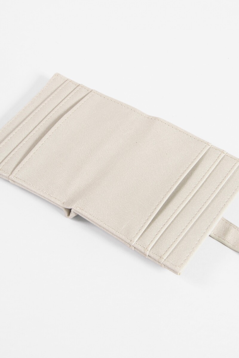 Tarjetero flap shinny crudo