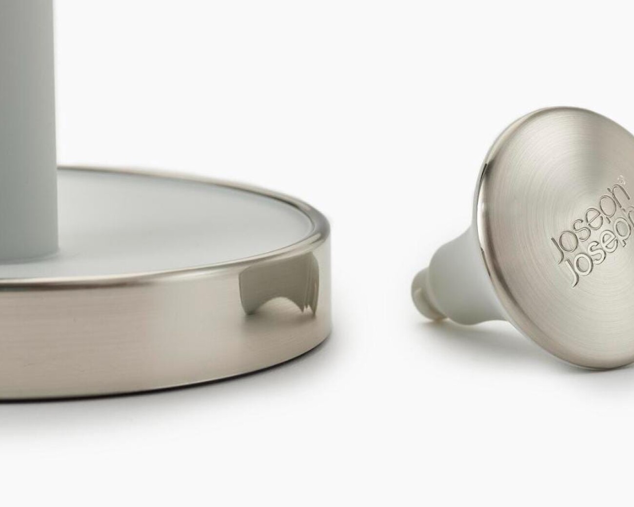 Porta rollo de cocina con tapa presionable para bloquear el rollo. Porta rollo de cocina con tapa presionable para bloquear el rollo.