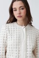 Chaqueta eco cuero con tul crudo