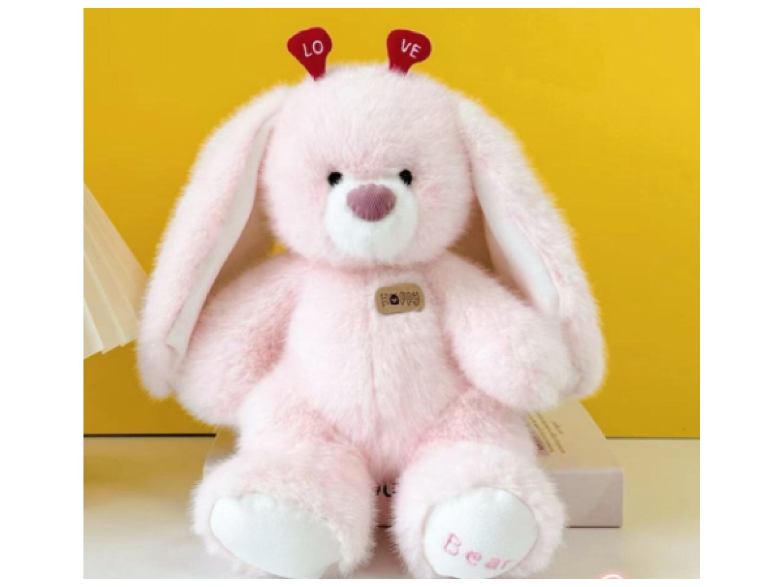 JUGUETE DE PELUCHE (CONEJO DE CORAZÓN AMOROSO EN POSICIÓN SENTADA/ROSA) 