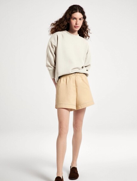 BUZO CON PUÑOS ELASTIZADOS BEIGE