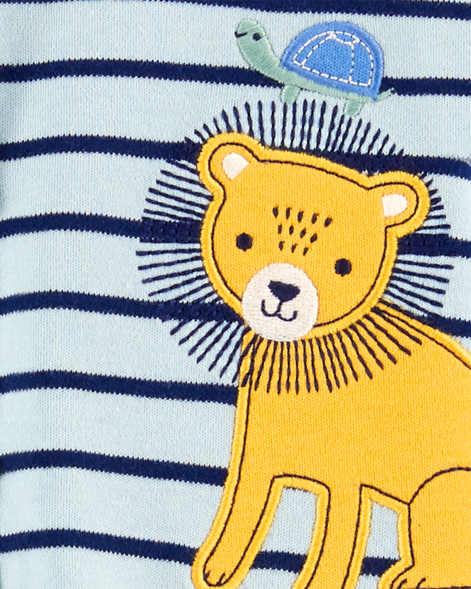 Pijama una pieza de algodón con pie estampa león Pijama una pieza de algodón con pie estampa león