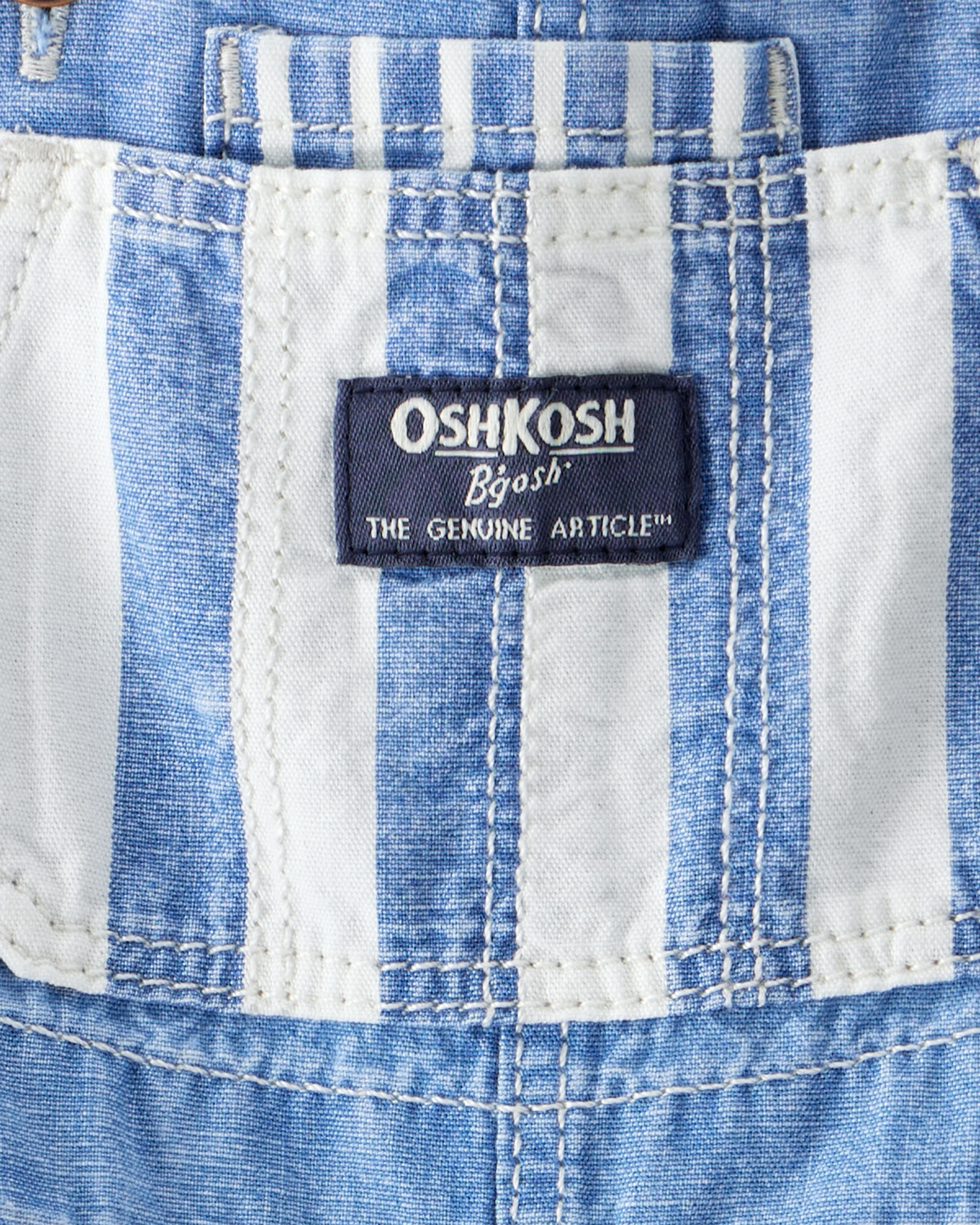 Enterito de chambray con detalles a rayas Enterito de chambray con detalles a rayas