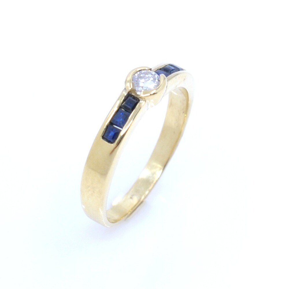 Anillo en oro 18k , brillante y zafiros Anillo en oro 18k , brillante y zafiros