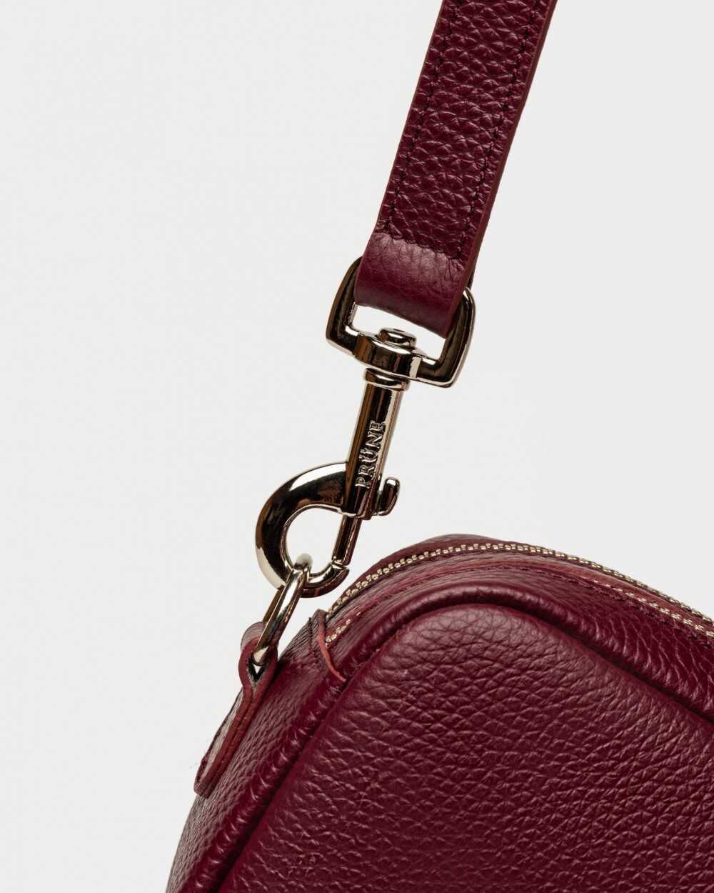 Bandolera New Eterial en Cuero Graneado Bordeaux