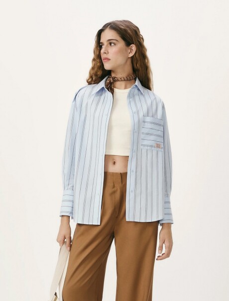 BLUSA CROPPED EN TELA ACANALADA BEIGE