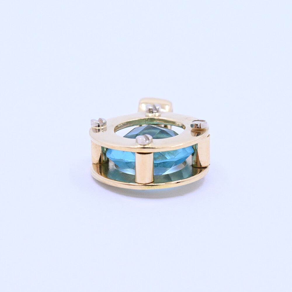 Colgante oro 18k 2 tonos con topacio azul. Colgante oro 18k 2 tonos con topacio azul.