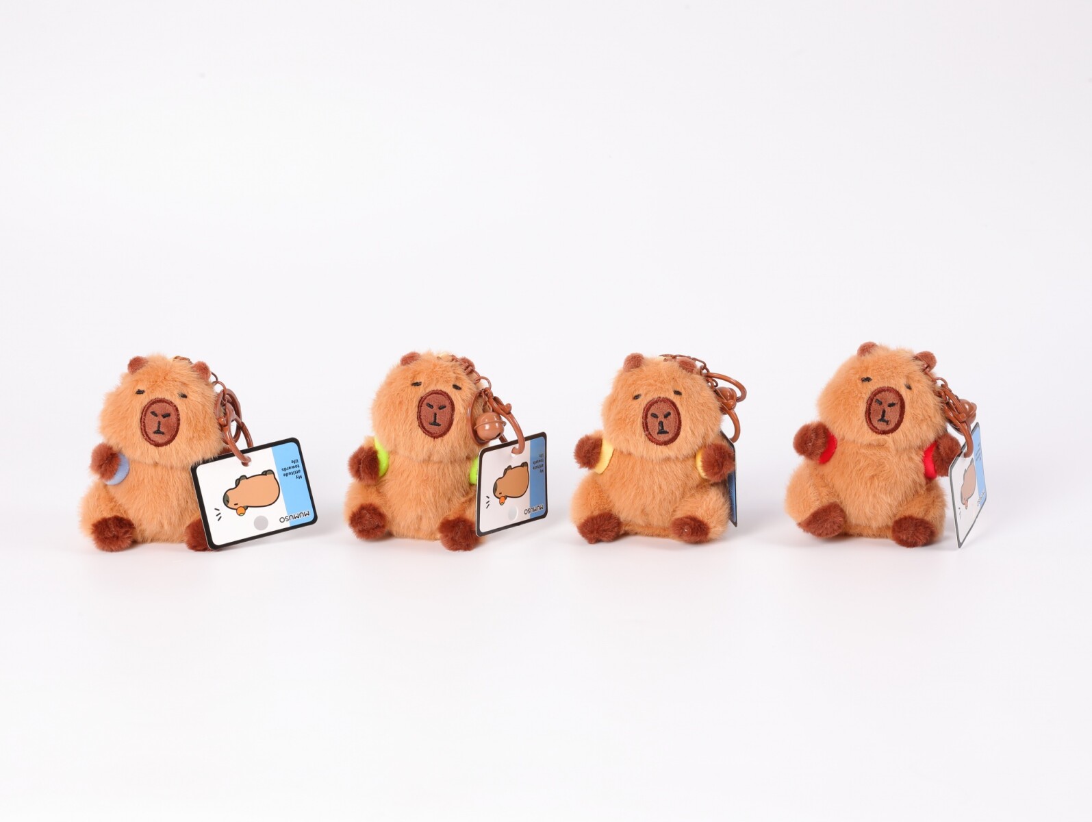 COLGANTE PARA BOLSA (CAPIBARA CON EQUIPO DEPORTIVO) 